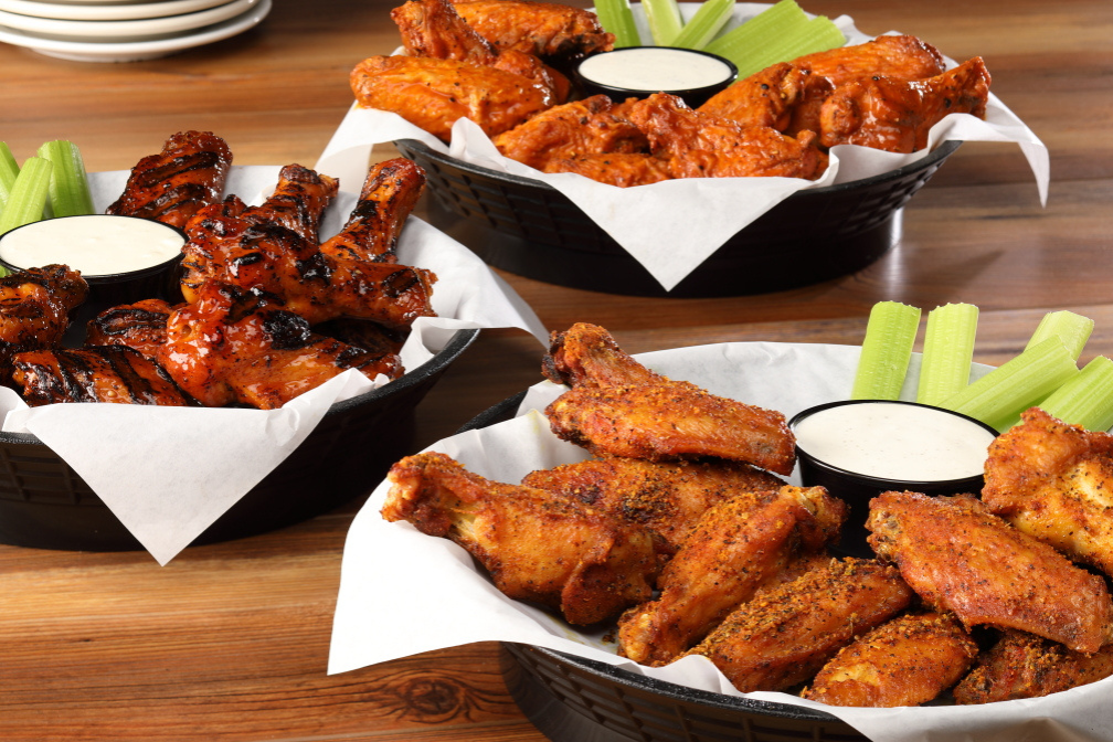Three plates of wings.